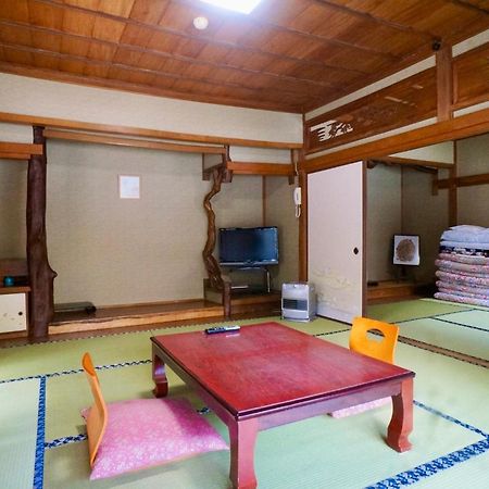 Takaosou Hotel Yufu Bagian luar foto