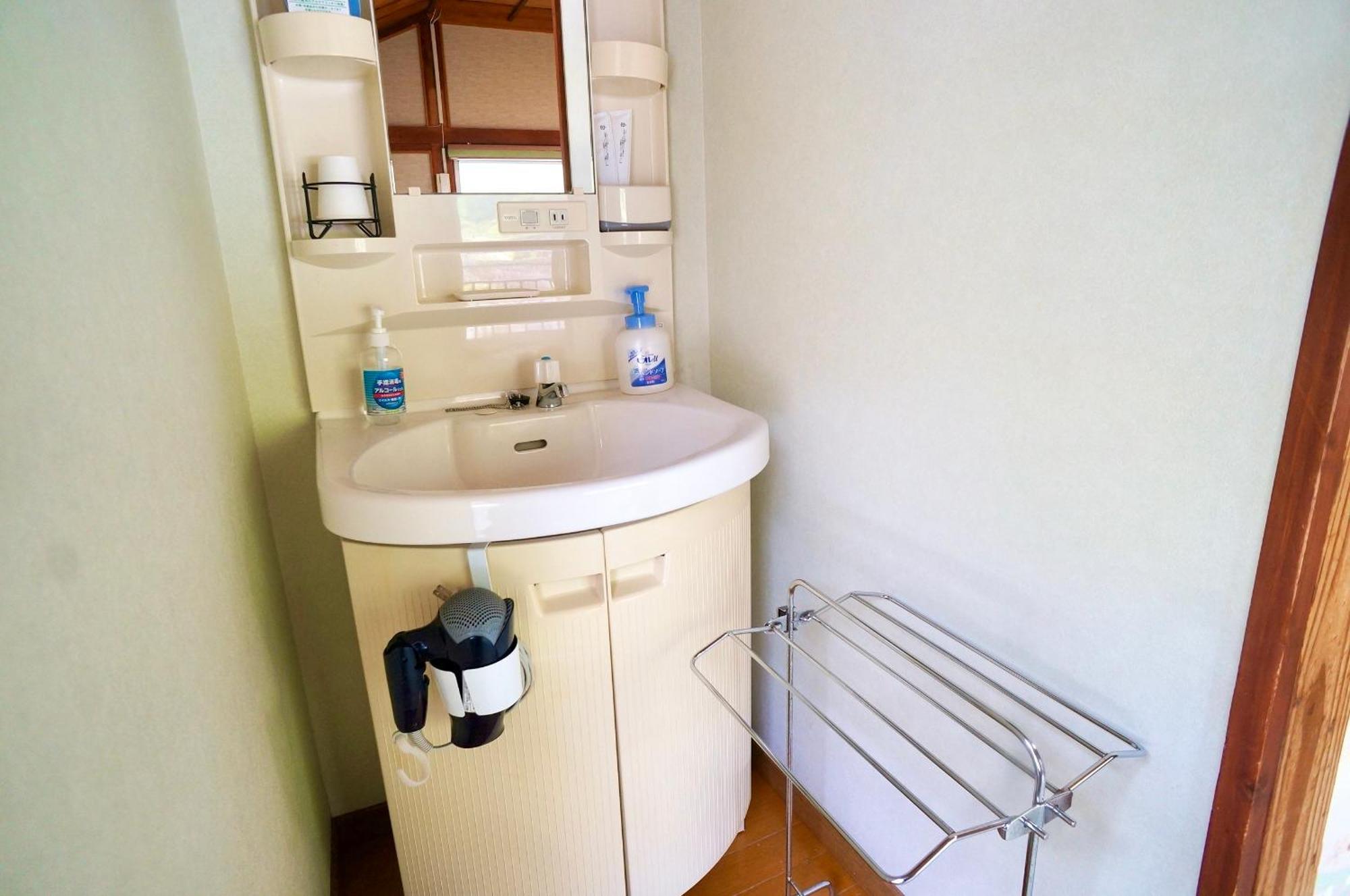 Takaosou Hotel Yufu Bagian luar foto