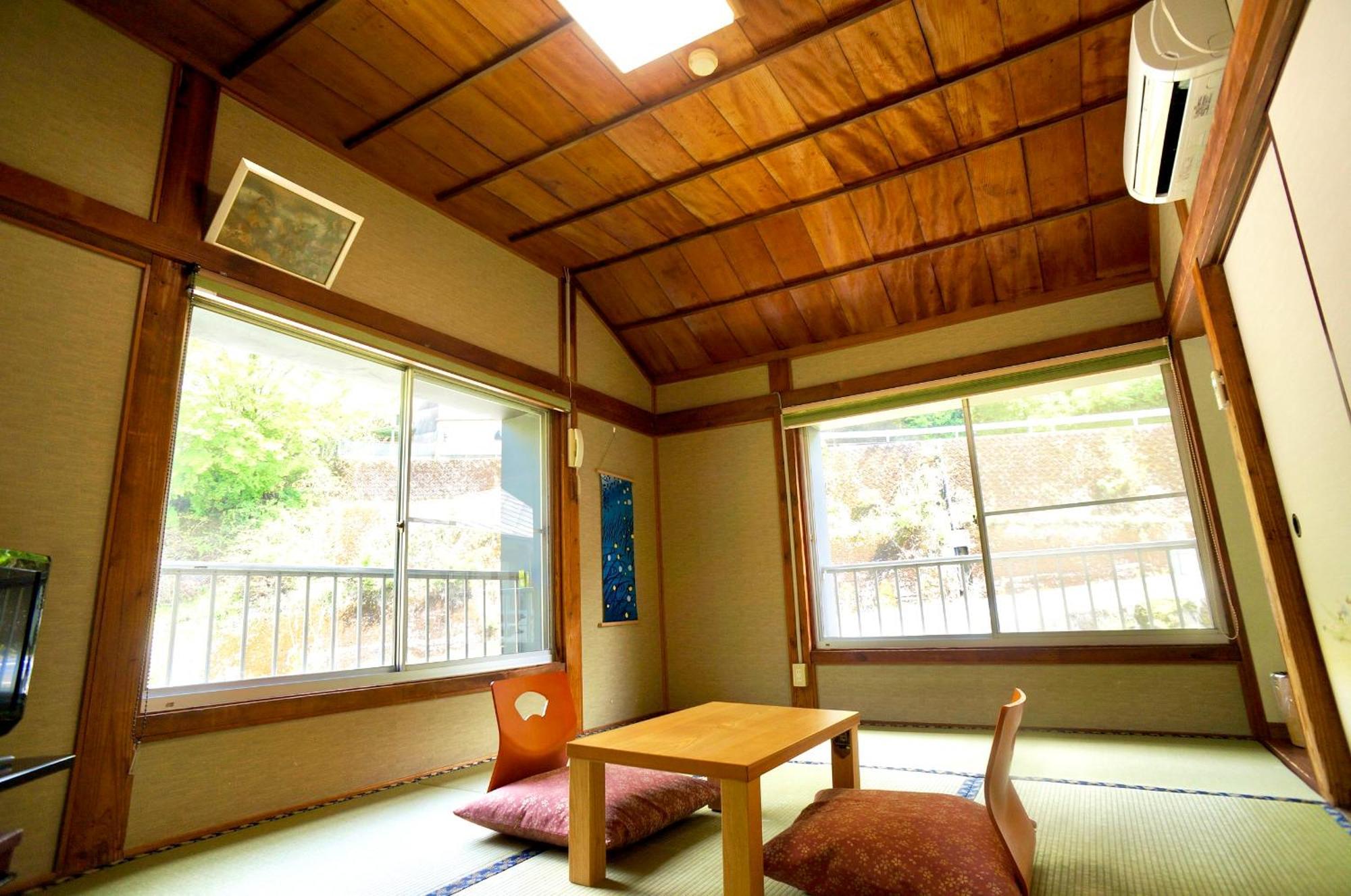 Takaosou Hotel Yufu Bagian luar foto