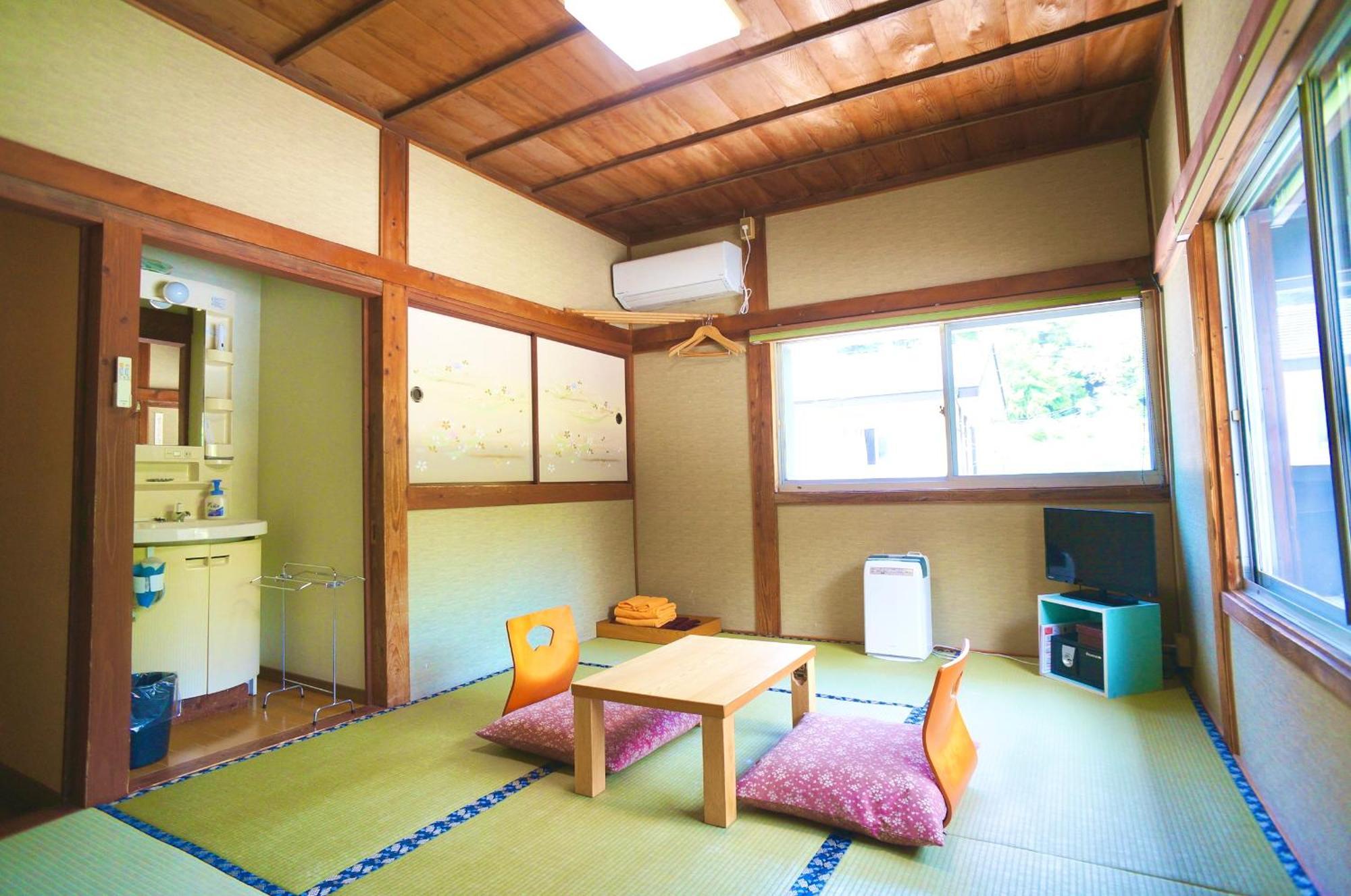 Takaosou Hotel Yufu Bagian luar foto