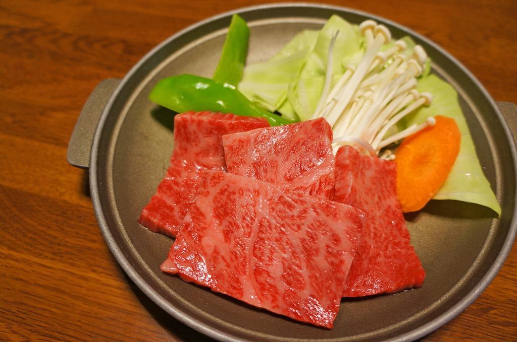 Takaosou Hotel Yufu Bagian luar foto