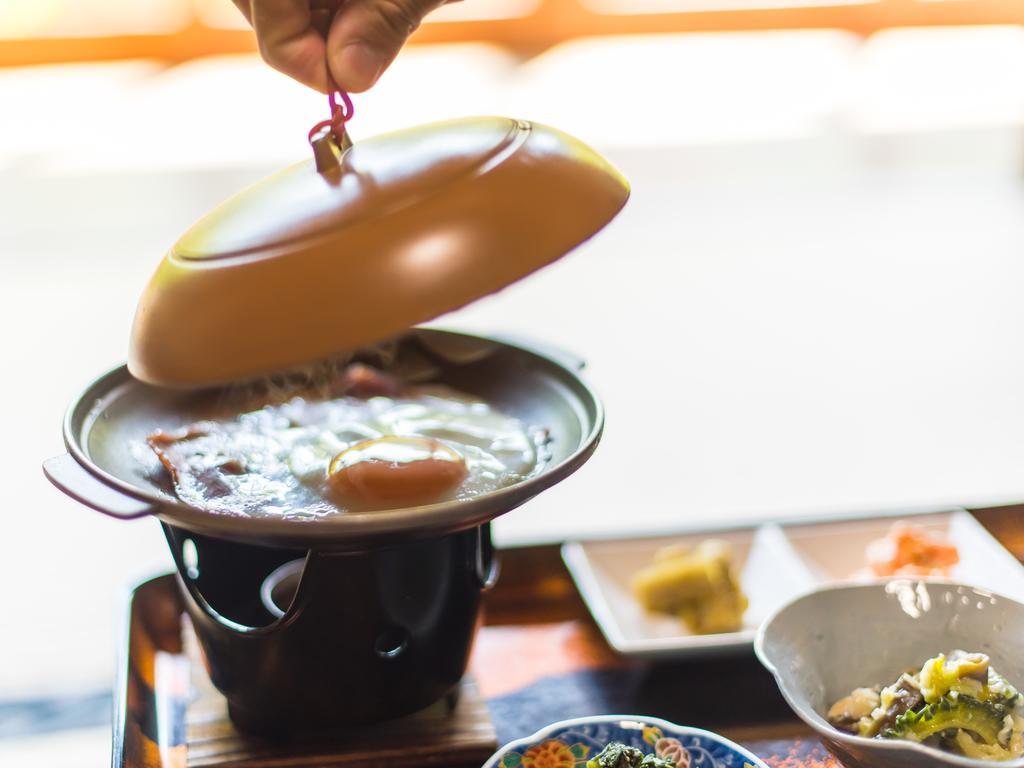 Takaosou Hotel Yufu Bagian luar foto