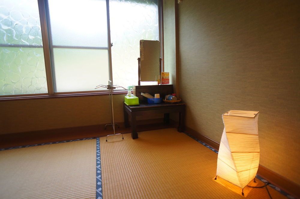Takaosou Hotel Yufu Bagian luar foto