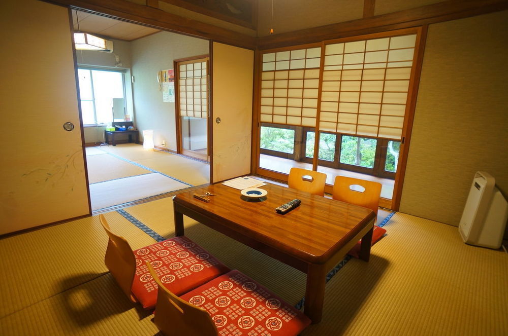 Takaosou Hotel Yufu Bagian luar foto