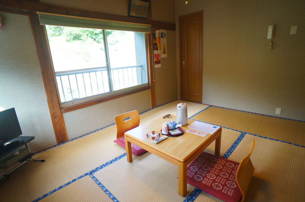 Takaosou Hotel Yufu Bagian luar foto