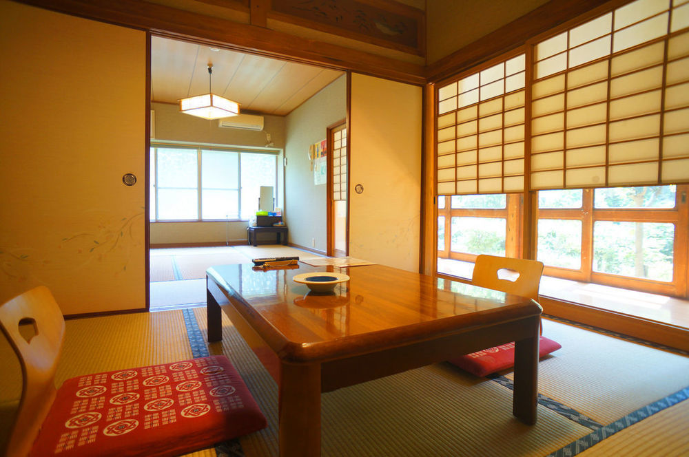 Takaosou Hotel Yufu Bagian luar foto