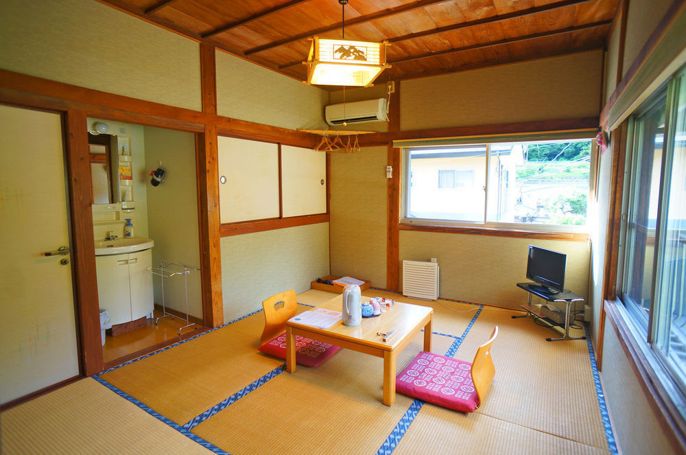 Takaosou Hotel Yufu Bagian luar foto